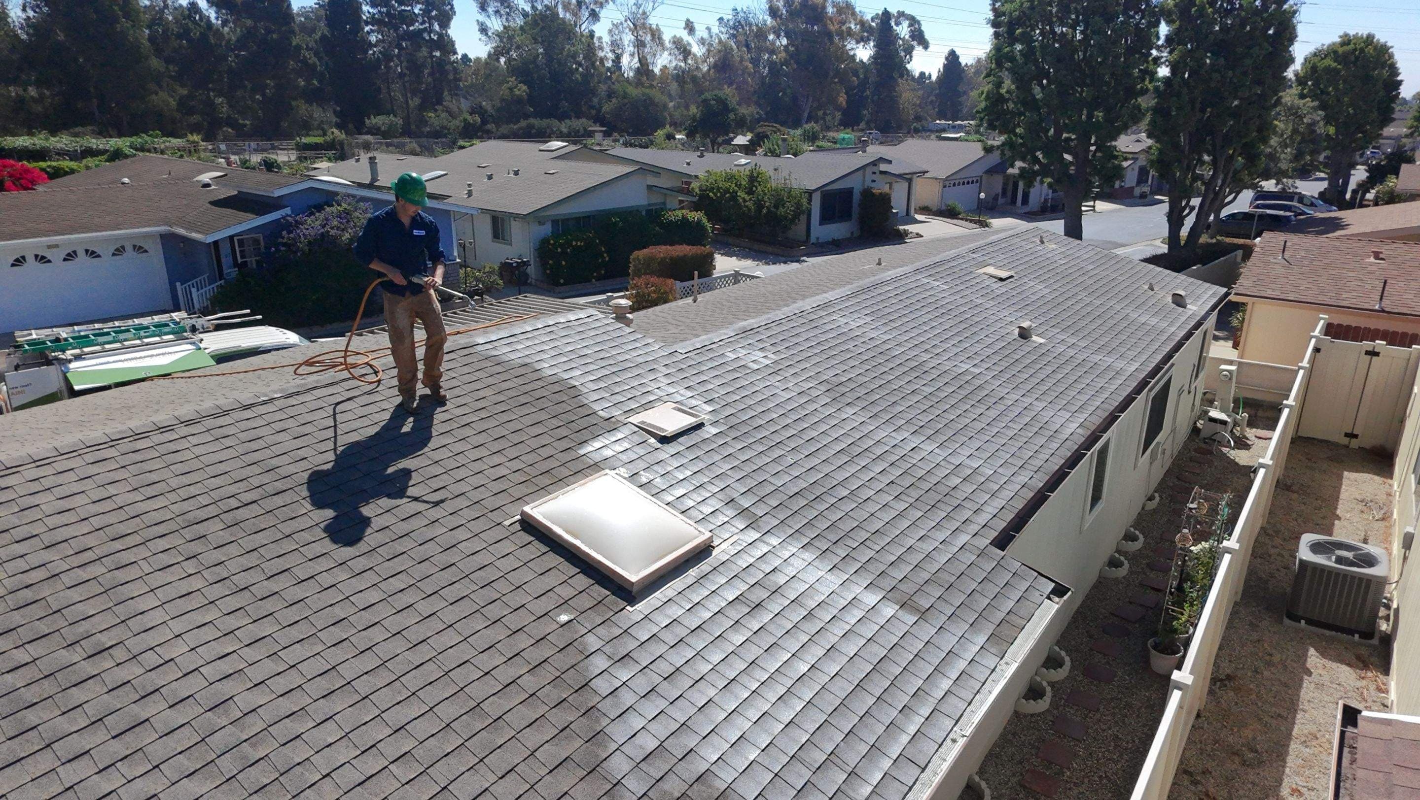 A manufactured-home park in Ventura on a treatment day, with a ladder up.