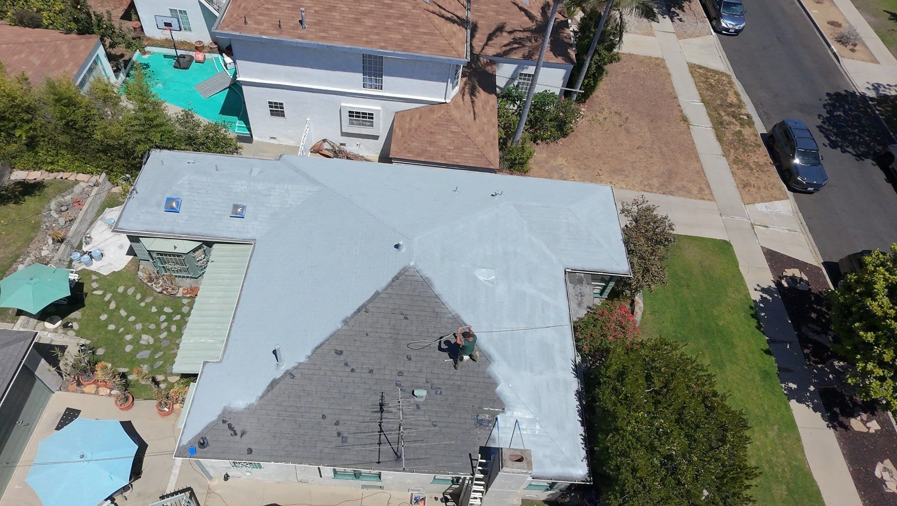 Aerial view of a finished white coating on a Los Angeles roof.